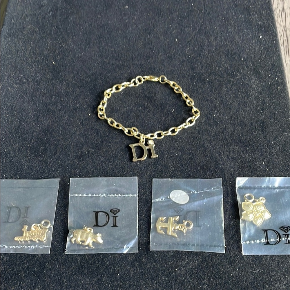Diamond International Gold Chain Bracelet with 4 Charms